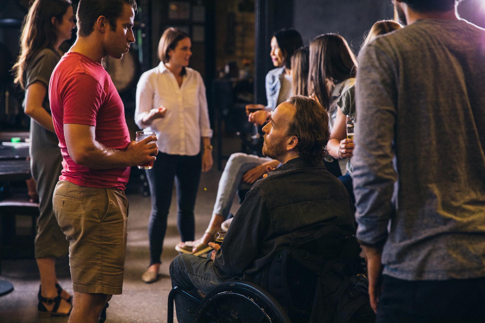 group of people drinking and talking